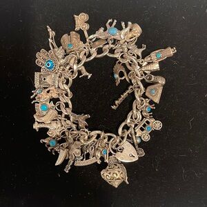 VINTAGE STERLING AND TURQUOISE LOADED WESTERN NATIVE AMERICANA CHARM BRACELET